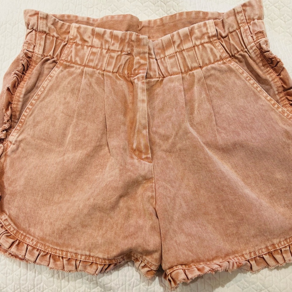 Sea Pink washed denim paper bag shorts with frills on the bottom. NWT